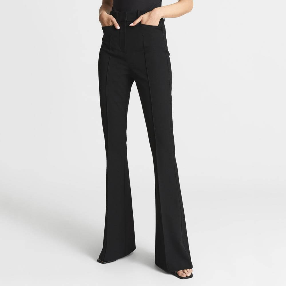 https://cdn.jarrolds.co.uk/products-temp/reiss/reiss-dylan-black-flared-trousers-model-front-shot%7Bw=1000,h=1000%7D.jpg